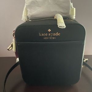 Small adorable black Kate Spade bag. New w tags!